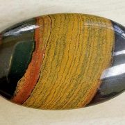 Highly polished Tiger Iron comfort stone approx size 50 x 30 mm Being a natural product this crystal may have natural blemishes and vary in colour and banding. www.naturalhealingshop.co.uk based in Nuneaton for crystals, spiritual healing, meditation, relaxation, spiritual development,workshops.