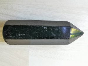 Highly polished Tourmaline wand approximate height 70 mm Used in crystal healing and meditation. Excellent for collectors. Being a natural product this crystal may have natural blemishes and vary in colour. www.naturalhealingshop.co.uk based in Nuneaton for crystals, spiritual healing, meditation, relaxation, spiritual development,workshops.