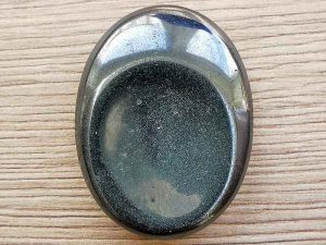 Highly polished Hematite thumb stone. The thumb stones have been designed to have a pleasing feel with the highest quality finish. They are shaped to fit beautifully between the thumb and fingers. Being a natural product these stones may have natural blemishes and vary in colour and banding. www.naturalhealingshop.co.uk based in Nuneaton for crystals, spiritual healing, meditation, relaxation, spiritual development,workshops.