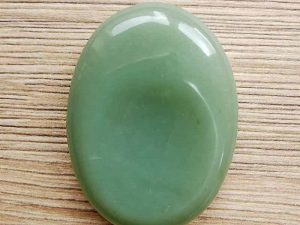 Highly polished New Jade thumb stone 40 x 30 mm. The thumb stones have been designed to have a pleasing feel with the highest quality finish. They are shaped to fit beautifully between the thumb and fingers. Being a natural product these stones may have natural blemishes and vary in colour and banding. www.naturalhealingshop.co.uk based in Nuneaton for crystals, spiritual healing, meditation, relaxation, spiritual development,workshops.