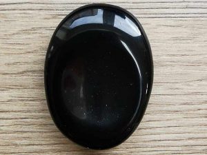 Highly polished Obsidian thumb stone 40 x 30 mm. The thumb stones have been designed to have a pleasing feel with the highest quality finish. They are shaped to fit beautifully between the thumb and fingers. Being a natural product these stones may have natural blemishes and vary in colour and banding. www.naturalhealingshop.co.uk based in Nuneaton for crystals, spiritual healing, meditation, relaxation, spiritual development,workshops.