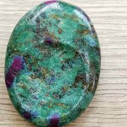 Highly polished Ruby Zoisite thumb stone 40 x 30 mm. The thumb stones have been designed to have a pleasing feel with the highest quality finish. They are shaped to fit beautifully between the thumb and fingers. Being a natural product these stones may have natural blemishes and vary in colour and banding. www.naturalhealingshop.co.uk based in Nuneaton for crystals, spiritual healing, meditation, relaxation, spiritual development,workshops.