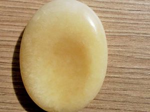 Highly polished orange calcite thumb stone 40 x 30 mm. The thumb stones have been designed to have a pleasing feel with the highest quality finish. They are shaped to fit beautifully between the thumb and fingers. Being a natural product these stones may have natural blemishes and vary in colour and banding. www.naturalhealingshop.co.uk based in Nuneaton for crystals, spiritual healing, meditation, relaxation, spiritual development,workshops.