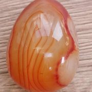 Highly polished Carnelian egg approximate height 45 mm. Beautiful to collect or hold and meditate with. Being a natural product these stones may have natural blemishes and vary in colour and banding. www.naturalhealingshop.co.uk based in Nuneaton for crystals, spiritual healing, meditation, relaxation, spiritual development,workshops.