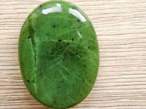 Highly polished Jade thumb stone 40 x 30 mm. The thumb stones have been designed to have a pleasing feel with the highest quality finish. They are shaped to fit beautifully between the thumb and fingers. Being a natural product these stones may have natural blemishes and vary in colour and banding. www.naturalhealingshop.co.uk based in Nuneaton for crystals, spiritual healing, meditation, relaxation, spiritual development,workshops.