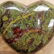 Highly polished dragon's blood jasper Heart approx 45 mm. These hearts are perfect for a gift! There are purple velvet pouches or organza bags you can purchase to pop them into for the finishing touch. Being a natural product these stones may have natural blemishes and vary in colour and banding. www.naturalhealingshop.co.uk based in Nuneaton for crystals, spiritual healing, meditation, relaxation, spiritual development,workshops.