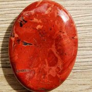 Highly polished poppy Jasper thumb stone 40 x 30 mm. The thumb stones have been designed to have a pleasing feel with the highest quality finish. They are shaped to fit beautifully between the thumb and fingers. Being a natural product these stones may have natural blemishes and vary in colour and banding. www.naturalhealingshop.co.uk based in Nuneaton for crystals, spiritual healing, meditation, relaxation, spiritual development,workshops.