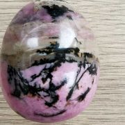 Highly polished Rhodonite egg approx height 45 mm. www.naturalhealingshop.co.uk based in Nuneaton for crystals, spiritual healing, meditation, relaxation, spiritual development,workshops.