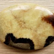 Septarian palmstone. The palm stones are made from the best grade rough materials to produce a well finished, highly polished product. Used by crystal healers and general therapists for massage and similar treatments. Also perfect for collectors. Being a natural product these stones may have natural blemishes and vary in colour and banding. www.naturalhealingshop.co.uk based in Nuneaton for crystals, spiritual healing, meditation, relaxation, spiritual development,workshops.