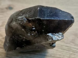 Smoky Quartz point approximate length 70 mm. Being a natural product this crystal may have natural blemishes and vary in colour and banding. www.naturalhealingshop.co.uk based in Nuneaton for crystals, spiritual healing, meditation, relaxation, spiritual development,workshops.