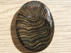 Highly polished Stromatolite thumb stone 40 x 30 mm. The thumb stones have been designed to have a pleasing feel with the highest quality finish. They are shaped to fit beautifully between the thumb and fingers. Being a natural product these stones may have natural blemishes and vary in colour and banding. www.naturalhealingshop.co.uk based in Nuneaton for crystals, spiritual healing, meditation, relaxation, spiritual development,workshops.