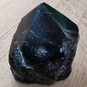 Highly polished Tourmline point approximate height 70 mm. Being a natural product this crystal may have natural blemishes and vary in colour. www.naturalhealingshop.co.uk based in Nuneaton for crystals, spiritual healing, meditation, relaxation, spiritual development,workshops..