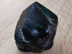 Highly polished Tourmline point approximate height 70 mm. Being a natural product this crystal may have natural blemishes and vary in colour. www.naturalhealingshop.co.uk based in Nuneaton for crystals, spiritual healing, meditation, relaxation, spiritual development,workshops..