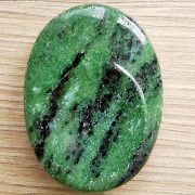 Highly polished Zoisite thumb stone 40 x 30 mm. The thumb stones have been designed to have a pleasing feel with the highest quality finish. They are shaped to fit beautifully between the thumb and fingers. Being a natural product these stones may have natural blemishes and vary in colour and banding. www.naturalhealingshop.co.uk based in Nuneaton for crystals, spiritual healing, meditation, relaxation, spiritual development,workshops.